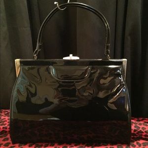 Large black vintage patent leather handbag
